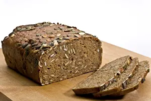 Studio Shot Of Bread Loaf Drucke: Rye bread with pumpkin seeds