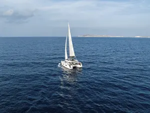 Mediterranean Sailboats Drucke: Sailing catamaran in full sail