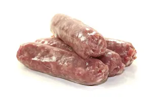 Salami Sausage Drucke: Salsiccia on a stack against a light-coloured background