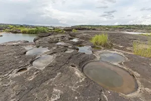 Eroded Mekong River Landscape Drucke: Sam Phan Bok on the Mekong River