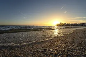 Benelux Evening Atmosphere Drucke: Sandy beach beach with waves at sunset