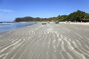 Blue Skies And Waves Drucke: Sandy beach in Samara, Playa Samara