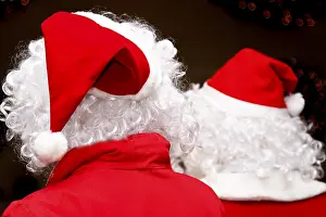 Father Christmas Costume Drucke: Two santas, viewed from behind