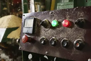 Industrial Building Architecture Drucke: At sawmill. Control panel with luminous indicators
