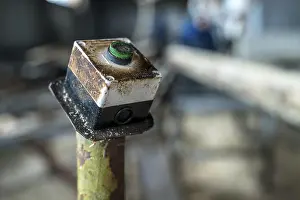 Industrial Architecture Style Drucke: Sawmill. Image of machine power button, close-up
