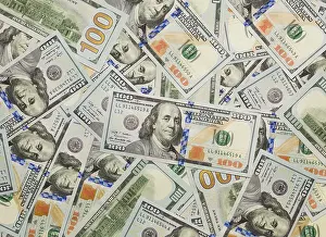 Newly Designed Dollar Bills Drucke: Several scattered layer of the newly designed U
