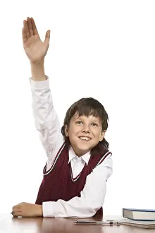 Young Learner Education Drucke: School boy hand raised for answer or question