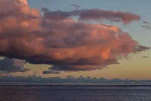 Deserted Beach At Dusk Drucke: Sea and dramatic cloud atmosphere