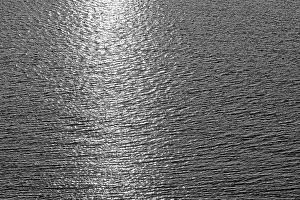 German Black And White Photography Drucke: Sea surface with small waves and light reflections