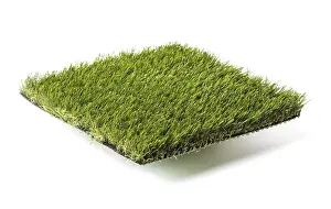 Artificial Turf Drucke: Section of artificial turf grass isolated on white background