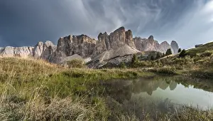 Sella Group Dolomites Drucke: Sella Group with Piscadu reflected in a pond