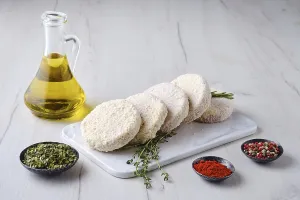 Gastronomy Food Images Drucke: Semifinished beef patties in breading on a kitchen table