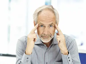 Business Professional Portrait Drucke: Senior, concentrating expression