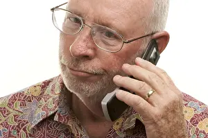 Male Human Being Drucke: Senior man using cell phone