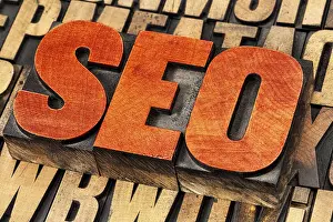 Vintage Letterpress Typography Drucke: SEO (search engine optimization) acronym - word abstract in vintage letterpress wood type stained by red ink