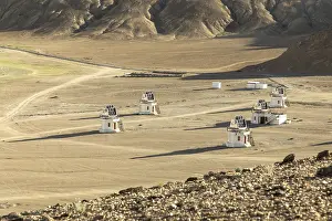 Remote Wilderness Photography Drucke: A series of small observatory structures dot the isolated