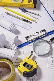 Construction Plan Details Drucke: Set of architect tools on blueprint