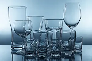 Blue Background Cutout Drucke: Set of different empty glasses on blue background