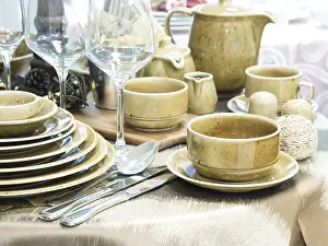 Elegant Dinner Setting Drucke: Set of new dishes on table with tablecloth