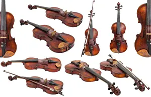 String Instrument Photography Drucke: Set of old violins against white background