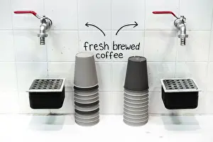 Benelux Countries Cuisine Drucke: A setup of two coffee taps with stacks of cups