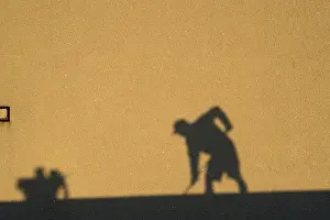 Human Being At Work Drucke: Shadow of a construction worker