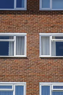 Uninhabited Urban Environment Photo Drucke: Shapes and pattern of four windows in a block of flats