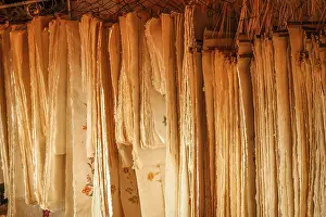 Deserted Industrial Building Drucke: Sheets of paper hanging In a storage