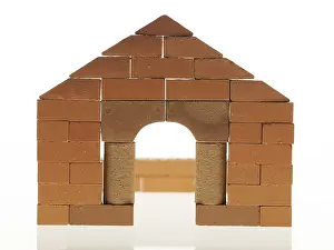 Construction Site Images Drucke: Shell of a house with a brick facade