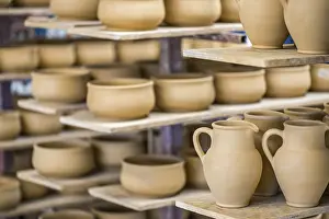 Deserted Studio Drucke: Shelves with ceramic dishware in pottery workshop