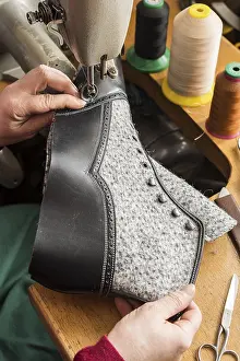Sewing Machine Operator Drucke: Shoemaker, hands sewing with machine finished upper part