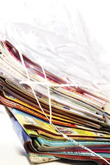 Piled Up Papers Drucke: Shredded paper, stack of magazines