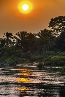 Deserted Riverbank Scene Drucke: Sidearm of the Congo river at sunset, DR Congo