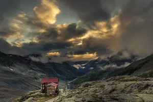 Dramatic Cloudy Sky Europe Drucke: Siegerlandhutte at sunset with dramatic cloudy sky