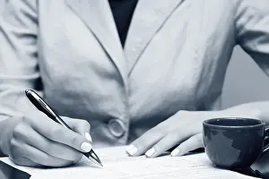 Female Manager In Office Drucke: Signing the contract