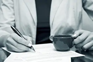 Female Manager At Work Drucke: Signing contract