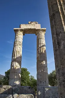 Archaeological Site Drucke: Single antique column with clear sky in the background