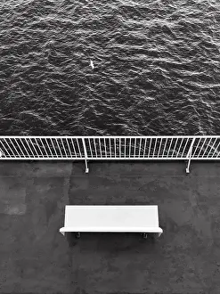 View From Above Ireland Drucke: Single bench from above, railing