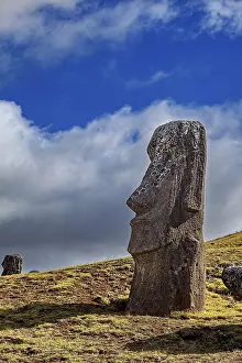 Blue Sky Landscapes Drucke: A single moai against a blue sky with clouds on Easter Island