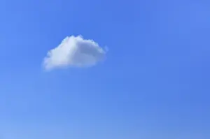 Blue Sky Germany Drucke: Single small cloud in the blue sky