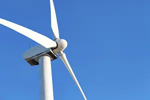 Renewable Energy Solutions Drucke: Single wind turbine over dramatic blue sky