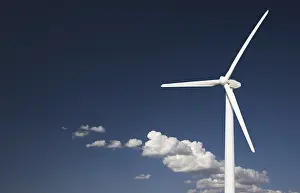 Wind Turbine Blue Sky Drucke: Single wind turbine over dramatic blue sky and clouds