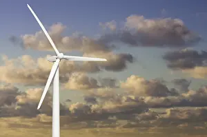 Blue Sky Drucke: Single wind turbine over dramatic blue sky and clouds