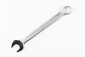 Bright Studio Shot Drucke: A single wrench on a white background