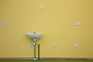 Copy Space For Texting Drucke: Sink on the wall in an empty room