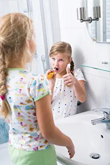 Oral Hygiene For Kids Drucke: Sisters brushing teeth in the bathroom
