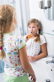 Oral Hygiene For Kids Drucke: Sisters brushing teeth in the bathroom