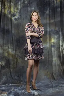 Fashion Glamour Model Drucke: Size plus model in dress posing in studio over abstract background