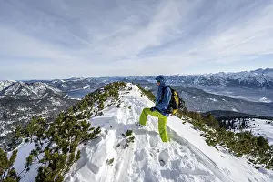 Snow Capped Mountain Peak Drucke: Ski tourer at the summit of Simetsberg