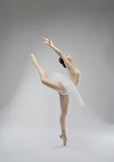 Ballet Dancer Drucke: A skilled ballet dancer gracefully leaps in a studio